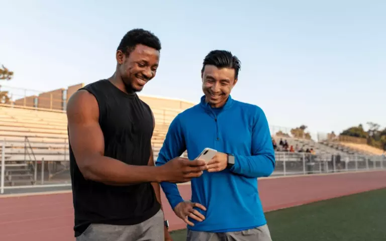 Men looking at a Fitness App