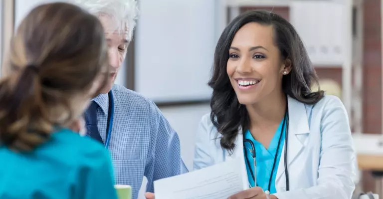 doctor reviewing a patient screening