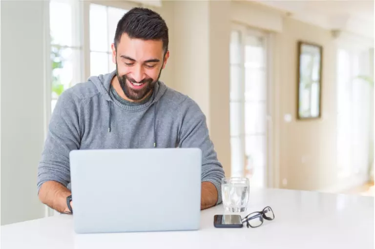 employee completing an annual health assessment on laptop