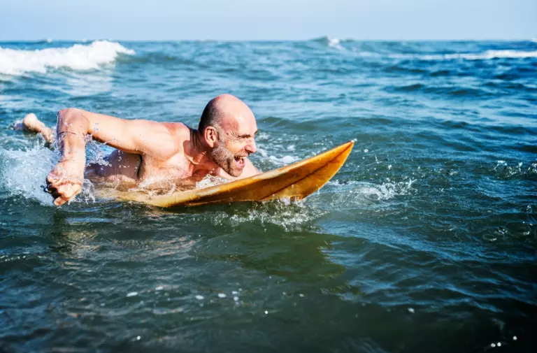 swimming in the ocean for a fitness reward