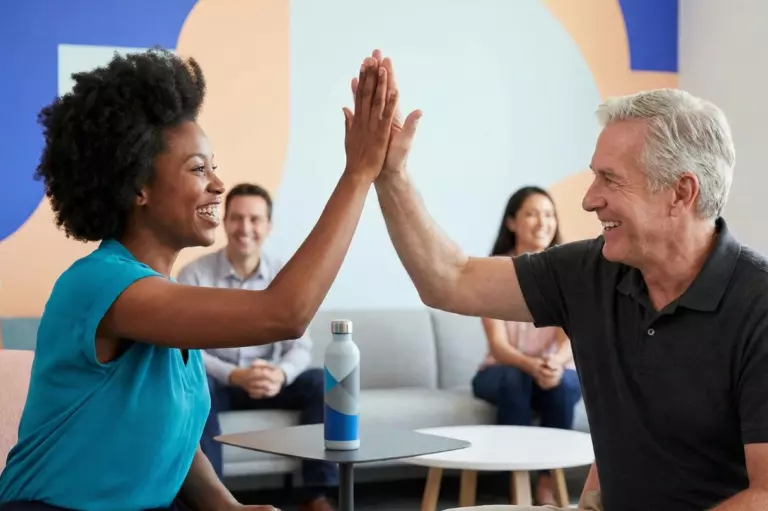 employee high-five